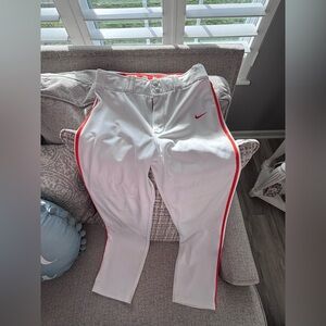 Nike dri-fit boys baseball pants. Size YL. White with orange stripe